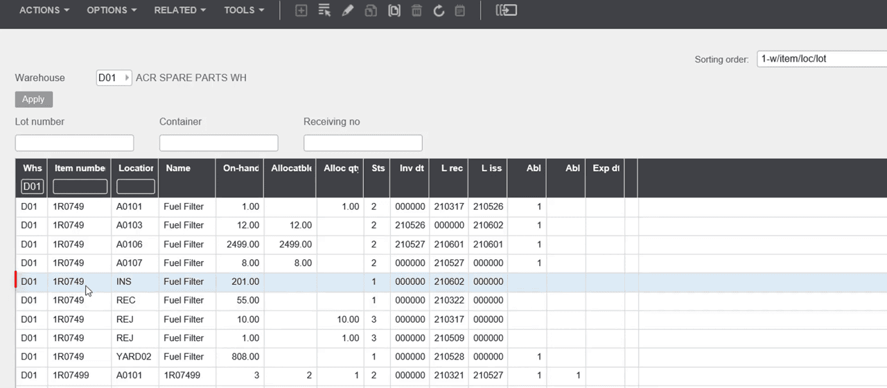 Infor M3 warehouse balance grid showing on-hand and allocated quantities by storage location