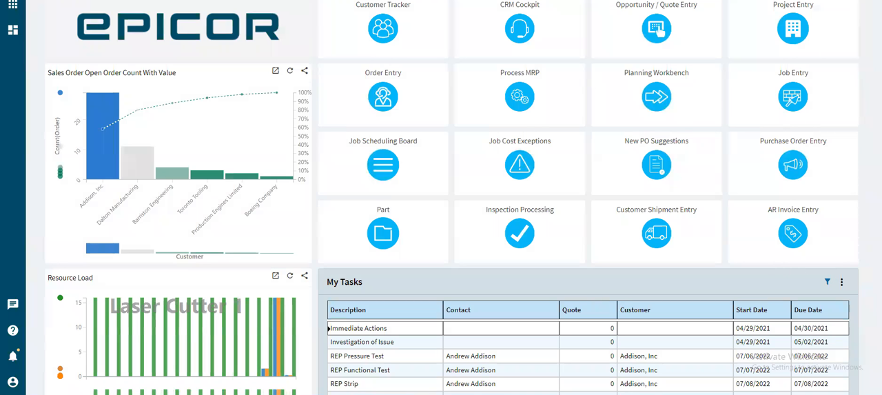 Epicor Kinetic home dashboard with sales order value chart, resource load graph, and quick-access module tiles