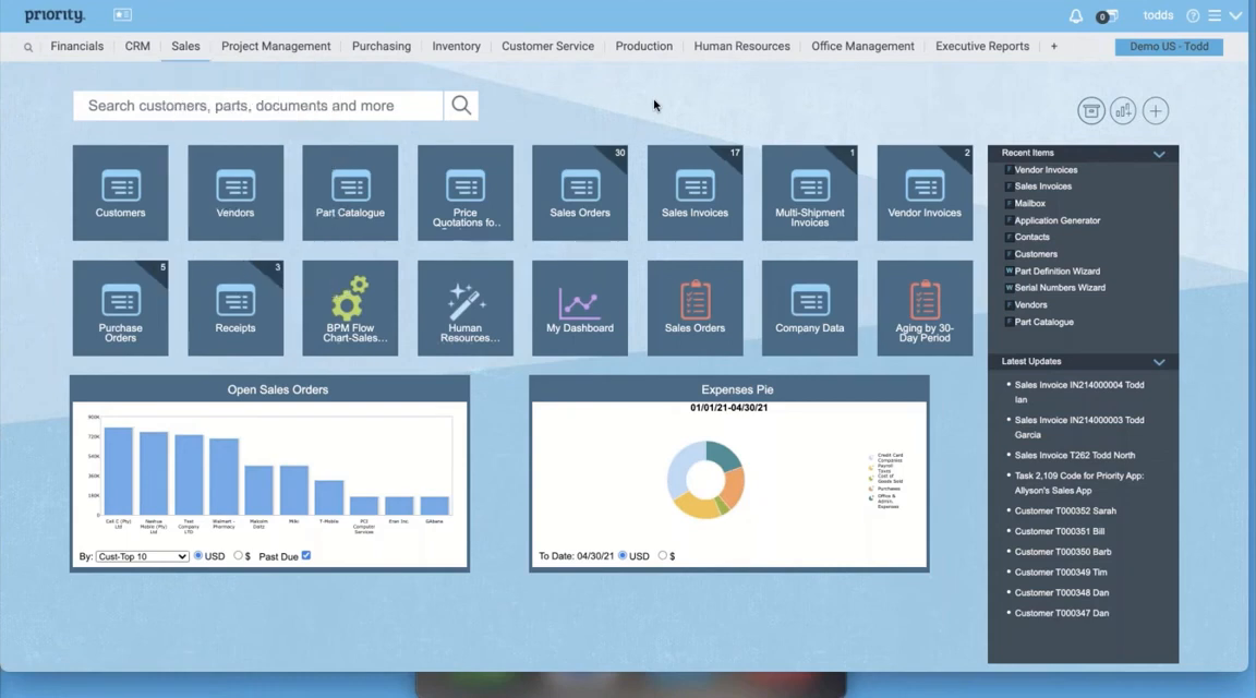 Priority ERP home dashboard with module tiles, open sales orders chart, and expenses pie chart